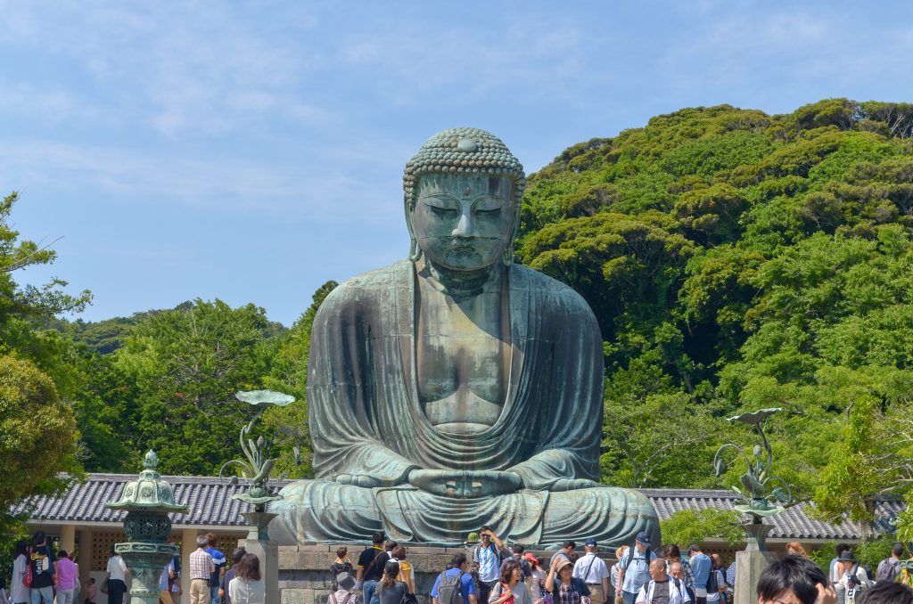 Kamakura's famous Buddha statue is worth visiting during your two weeks in Japan